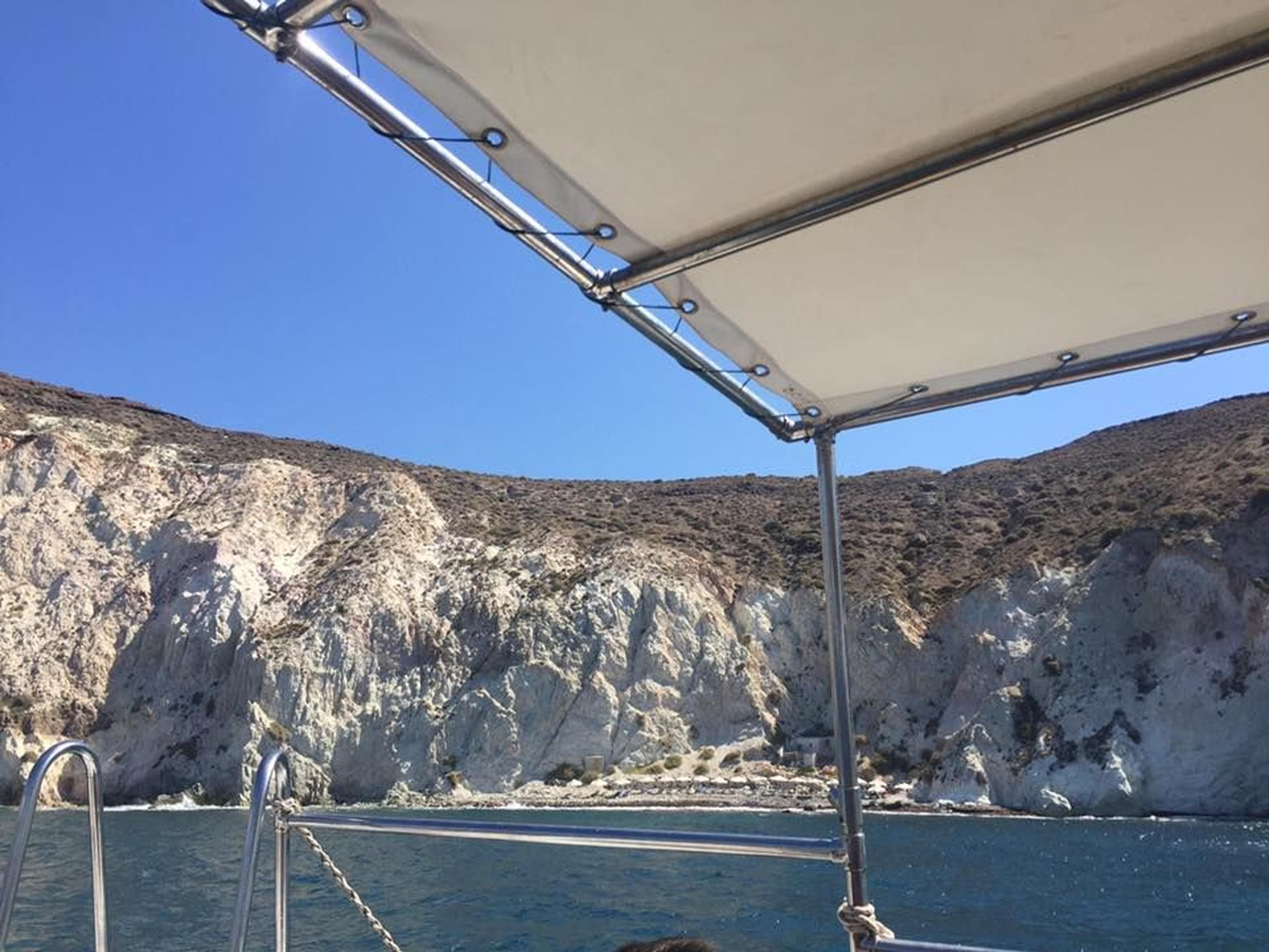 Taxi boat white beach santorini